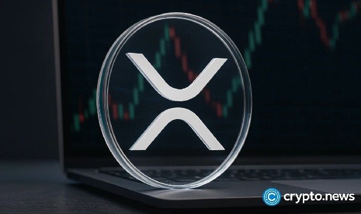 هل سيخترق سعر XRP المثلث المتناظر أم ينزلق مع تحول مؤشر الماكد على المخطط الرباعي الساعي نحو الهبوط عند القمة؟